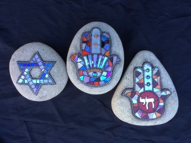 Recently we have been asked to create colorful rock mosaics with  religous or cultural themes. Contact us to have one of these lasting gems made to order for yourself or a loved one.

pearse@splashmosaic.com